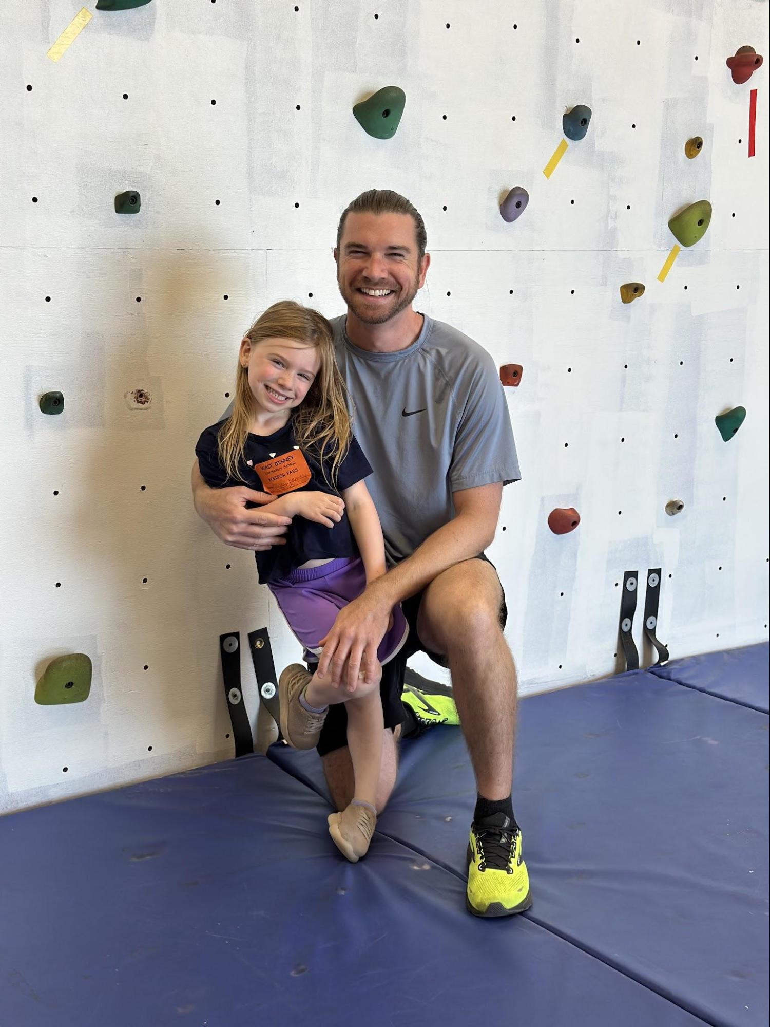 Coach Scott Kennedy with his daughter